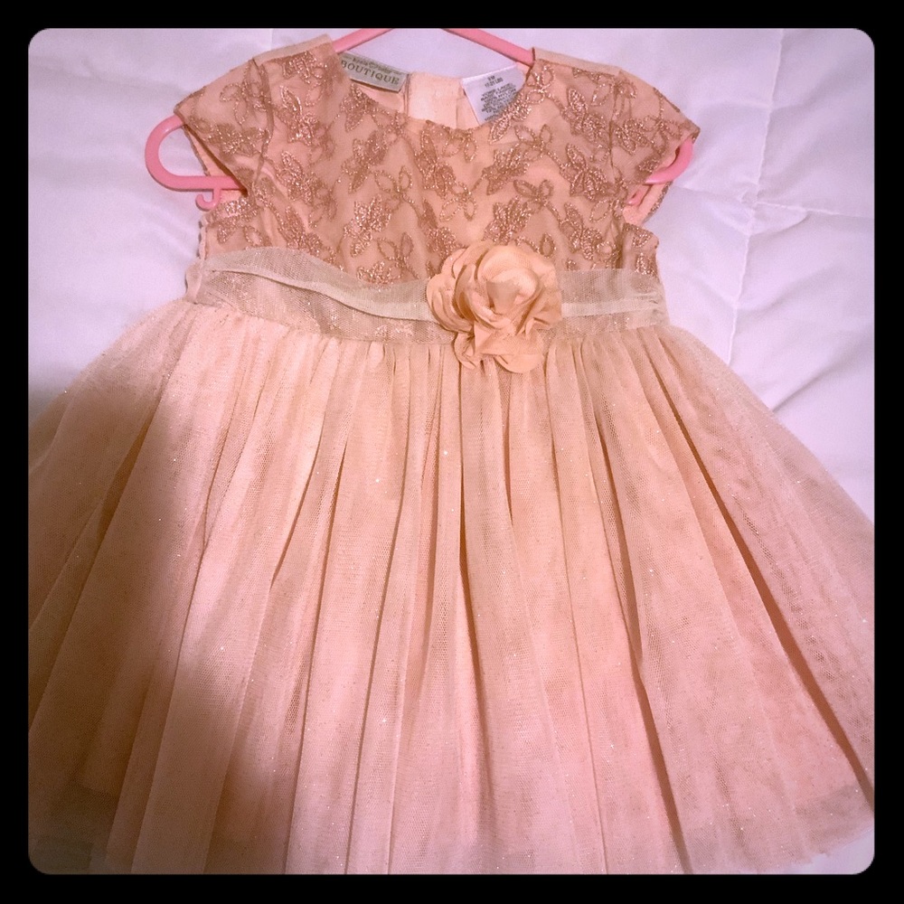 Girls dress/used once/peach color in a great shape